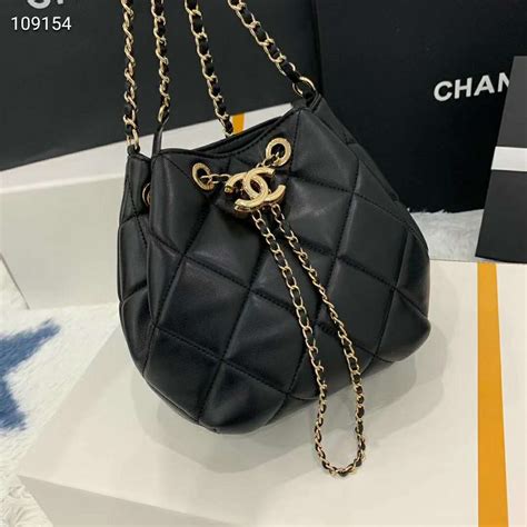 chanel black and white small drawstring crossbody bag|Backpacks .